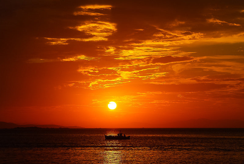 Sunset over Mykonos Bay